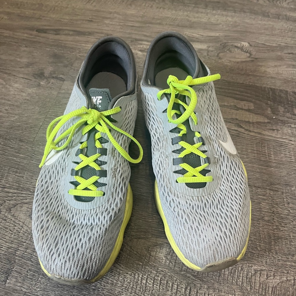 Nike women’s  Gray and Yellow Running Shoes “Zoom”